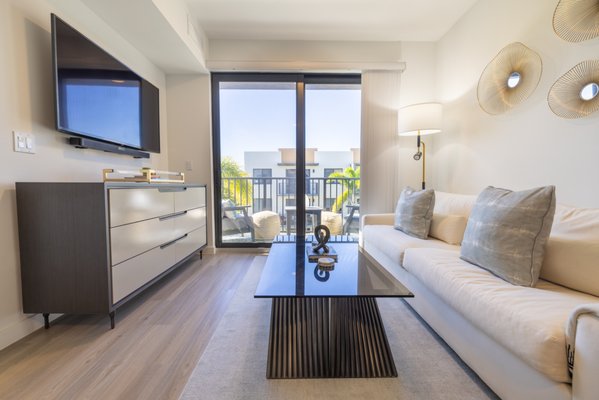 Tiny Living Design By Domestic Possessions - Visit Us At https://www.domesticpossessions.com/

This fabulous one bedroom apartment was transformed into a cozy home with a view for our clients! 

Working with Domestic Possessions gives you the ability to completely customize your look. From fabric colors to wood finishes, and more!