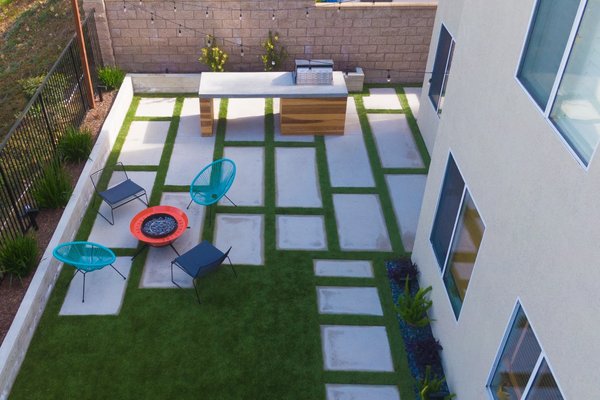 Backyard wooden theme BBQ and deck - This project took place in the city of Aliso Viejo. Our team took a very modern approach with a bit of a bohemian touch. We decided to offset some of the concrete steps and build a unique barbecue with wood siding and concrete countertops. This vibing backyard is ready for entertaining. Backyard wooden theme BBQ and deck - This project took place in the city of Aliso Viejo. Our team took a very modern approach with a bit of a bohemian touch. We decided to offset some of the concrete steps and build a unique barbecue with wood siding and concrete countertops. This vibing backyard is ready for entertaining.