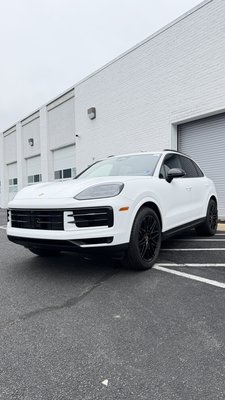 Full matte white vinyl wrap - This Porsche Cayenne come to our shop the receive a matte white vinyl wrap to go to a show where an artist will do a canvas on it for a beneficial organization