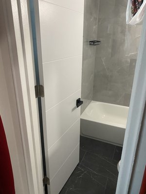Replacing the door in the toilet - We installed a brand new interior door with a modern matte black handle. The alignment was carefully done to ensure smooth operation and a clean finish. The new door added a sleek, updated look to the room. The client was very happy with the result. Replacing the door in the toilet - We installed a brand new interior door with a modern matte black handle. The alignment was carefully done to ensure smooth operation and a clean finish. The new door added a sleek, updated look to the room. The client was very happy with the result.