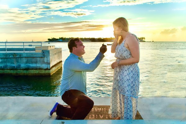 A Beautiful Sunset Proposal - This was a proposal at sunset at Mallory Square. I and the soon to be husband devised a plan where I would ask the couple if they would like their photo. When I asked them both if they were ready, he went down on one knee. It was truly a special moment to be a part of.