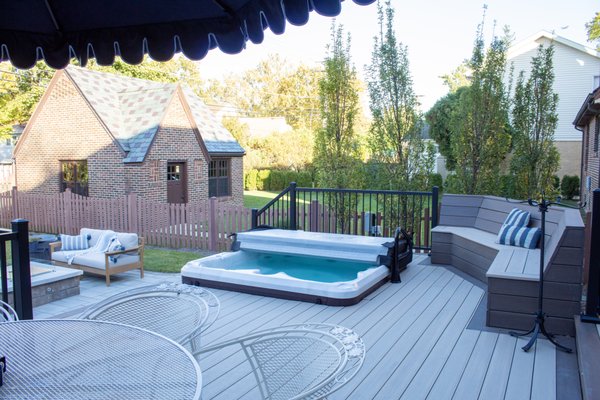 Modern Outdoor Retreat - Perfect for entertaining, unwinding, and enjoying year-round, this multi-level deck and patio blend seamlessly with elegant finishes and thoughtful design. Modern Outdoor Retreat - Perfect for entertaining, unwinding, and enjoying year-round, this multi-level deck and patio blend seamlessly with elegant finishes and thoughtful design.