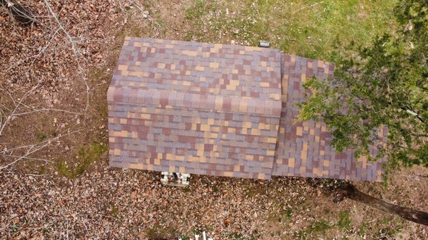 Roof Replacement on Shed - This was an exterior shed that was falling apart due to improper installation of the shingles and underlayment. We were able to replace the roofing system and replace most of the decking in less than one day.