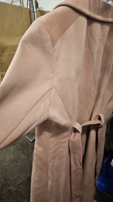 Women Wool Winter Coat Alteration - Size was small. Taken out the shoulder and back. Armscye alteration. Women Wool Winter Coat Alteration - Size was small. Taken out the shoulder and back. Armscye alteration.