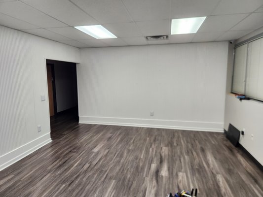 Lobby Refresh 2024 - This lobby remodel started out as an incomplete job left by the previous contractor with less-than-desirable results. With a little bit of creative thought, some millwork and paint, This lobby went from bore to more!