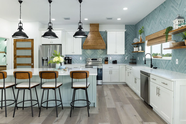 New Construction - Key Marathon - Step into a coastal-inspired kitchen that embodies the beauty of the Florida Keys. 

Our design is a blend of functionality and aesthetics that welcomes you into a world of natural elegance. 

The custom island features seafoam green cabinets, a nod to the serene waters of the Florida Keys. 

Equipped with a drawer microwave, it keeps the hustle and bustle away from the primary cooking areas, offering both convenience and style.

Like the soothing shades of the ocean, the color palette draws inspiration from nature. 

With our kitchen design, you'll experience the Florida Keys every day — right in your own home.