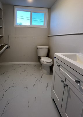 Water flood bathroom restoration remodel - Owner needed a bathroom restoration back to simple original form due to water damage along with relocating washer lines to opposite side of the wall into garage for more space in bathroom. Water flood bathroom restoration remodel - Owner needed a bathroom restoration back to simple original form due to water damage along with relocating washer lines to opposite side of the wall into garage for more space in bathroom.