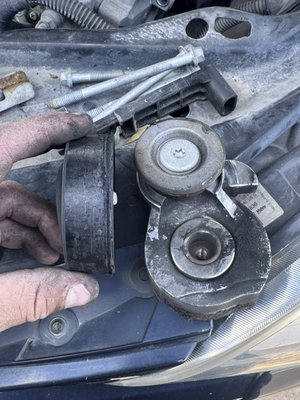 Serpentine belt, idler, tensioner replacement - Customer requested a serpentine belt replacement which turned out to be a lot more than that. The belt tensioner was completely destroyed and his idler pulley wasn’t far behind it. It only made a belt noise as usual while being a much larger problem. Serpentine belt, idler, tensioner replacement - Customer requested a serpentine belt replacement which turned out to be a lot more than that. The belt tensioner was completely destroyed and his idler pulley wasn’t far behind it. It only made a belt noise as usual while being a much larger problem.