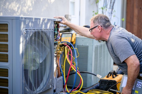 Saratoga central heat pump installation - This project consisted of two separate heat pump systems, replacing old, inefficient, and noisy 20+ year gas furnaces.
Before the project started, we made sure to review all local permitting guidelines and file permit applications with the city. Since this was a fairly involved project, the home was without heat for a night. We dropped off some loaner space heaters with the customer at no charge to make sure they were comfortable through the process.
We were able to deliver the project working within all of the constraints of the home, making complicated turns with our refrigerant piping to get from our equipment outside of the garage to the attic space. We were able to adapt in to their existing ductwork, and after startup the customer was pleased with the results. They are now able to maintain a comfortable space without the noise or expensive gas bills from before! Saratoga central heat pump installation - This project consisted of two separate heat pump systems, replacing old, inefficient, and noisy 20+ year gas furnaces.
Before the project started, we made sure to review all local permitting guidelines and file permit applications with the city. Since this was a fairly involved project, the home was without heat for a night. We dropped off some loaner space heaters with the customer at no charge to make sure they were comfortable through the process.
We were able to deliver the project working within all of the constraints of the home, making complicated turns with our refrigerant piping to get from our equipment outside of the garage to the attic space. We were able to adapt in to their existing ductwork, and after startup the customer was pleased with the results. They are now able to maintain a comfortable space without the noise or expensive gas bills from before!