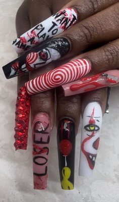 Halloween Nail Art - This customer wanted the movies "It", Saw, and other horror movies on her nail.