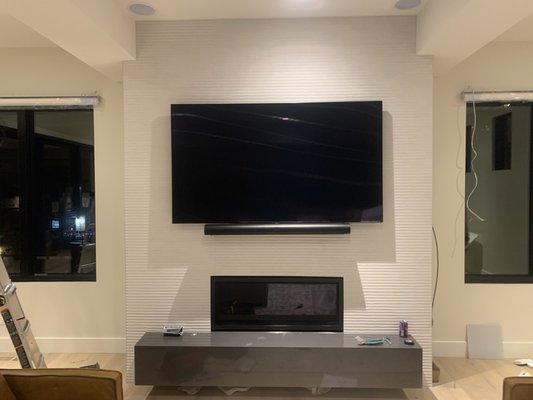 75" TV with Sonos Arc Soundbar - This beautiful fireplace is now the home for a rock solid entertainment system.
Sonos 5.1 surround sound was the obvious choice for this large of a room. 75" TV with Sonos Arc Soundbar - This beautiful fireplace is now the home for a rock solid entertainment system.
Sonos 5.1 surround sound was the obvious choice for this large of a room.