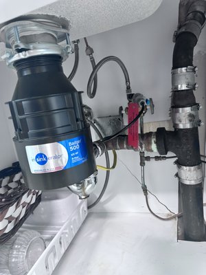Garbage Disposal Installation - Customer old garbage disposal was not working properly. We where hired to remove and install a new one and dispose of the old one.
