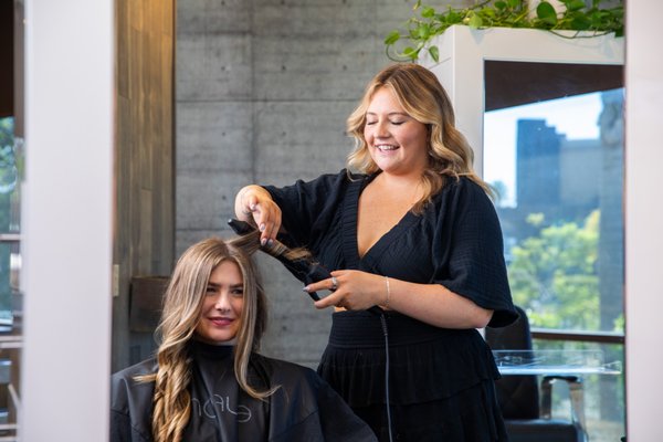 Custom color, cut and style - Custom highlights with carefully placed foils to brighten winter hair, paired with a fresh cut, color, and professional styling. Going out? Book a relaxing shampoo and blowout finished with soft curls. Custom color, cut and style - Custom highlights with carefully placed foils to brighten winter hair, paired with a fresh cut, color, and professional styling. Going out? Book a relaxing shampoo and blowout finished with soft curls.