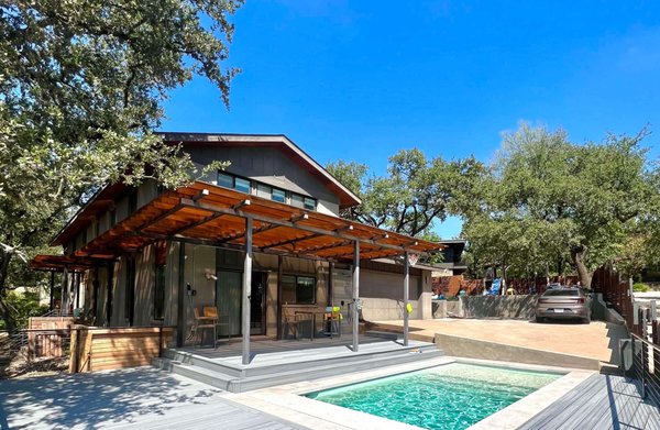 The Longhorn Project - This Longhorn fan underwent a complete transformation with plunge pool and a full outdoor concept. We first installed a custom-built composite deck with cable railing to make use of a unique yard shape around their new pool. We also built custom shade structures around the side and front of the house to keep the space comfortable in the brutal Texas heat. We always design our concepts around functionality and usability. The Longhorn Project - This Longhorn fan underwent a complete transformation with plunge pool and a full outdoor concept. We first installed a custom-built composite deck with cable railing to make use of a unique yard shape around their new pool. We also built custom shade structures around the side and front of the house to keep the space comfortable in the brutal Texas heat. We always design our concepts around functionality and usability.