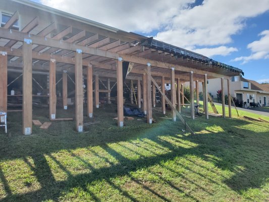 Massive New Deck Build - This was a 2,000 s.f. 2 story composite deck addition spanning most of the width of the home. standing on 18 solid concrete footings. Project was design built to be over engineered for strength and durability. Massive New Deck Build - This was a 2,000 s.f. 2 story composite deck addition spanning most of the width of the home. standing on 18 solid concrete footings. Project was design built to be over engineered for strength and durability.