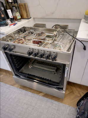 Bertazzoni Range Repair and Thermocouple Replacement - Bertazzoni gas range repair in Brooklyn. The issue was caused by a burned thermocouple. To complete the repair, the unit was disassembled from the top, oven interior, and rear panel. After thermocouple replacement, the range was reassembled and tested.