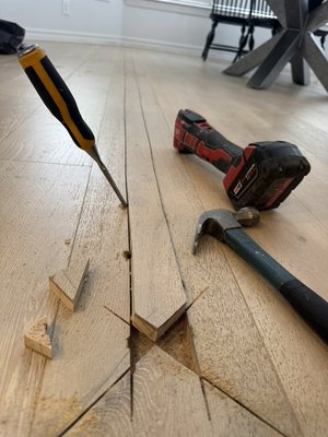 Hardwood Floorboard Replacemen - We performed the removal and replacement of damaged hardwood floorboards integrated into the existing flooring system. The process involved precise cutting, removal of deteriorated planks, subfloor inspection, and seamless integration of new boards. All work was completed in accordance with best practices for hardwood floor repair, ensuring structural integrity, visual consistency, and long-term durability.