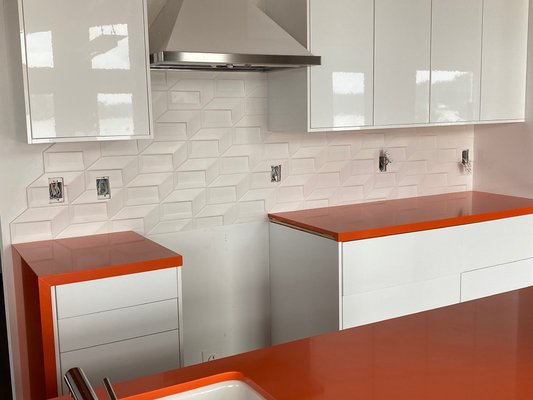Quartz by silestone - A complete upgrade on this kitchen remodel, the color on this kitchen countertop and subway tile backsplash .  kitchen countertops, white kitchen cabinets and wall tile backsplash .  waterfall on the end of the cabinet to give the wow factor and bring the orange color on the quartz.
Quartz supplier Silestone
Stone: orange cool
2cm slab thickness
3” mitered edge 
wall tile backsplash 



quartz company, quartz installer, quartz fabricator, countertop installation, quartz countertop, quartz countertop installer, tile backsplash installation, tile, kitchen backsplash, flooring installation, Bathroom remodel services, bathroom tile installation, shower tile installation.