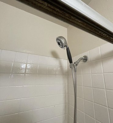 Shower fixture removal and replacement. - Client needed a new showerhead and tub spigot. Went to the store made a selection and then installed the new products after removing original ones.￼