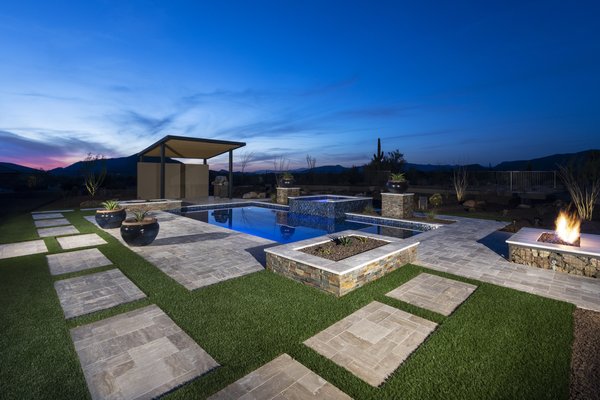 Andaluza Modern - Scottsdale - This project was one in which our clients were moving from California and were excited to create a space that that fit seamlessly into the desert without sacrificing their personal style.  We, with our clients, were aiming for a design that allows them to use their yard year round.  In planning, it was a focus to create distinct spaces, each with their own functional purpose – all while feeling connected to each other.