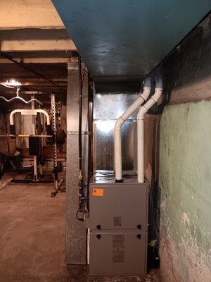 oil to gas conversion - Customer upgraded from oil fire furnace to a 96% efficiency gas furnace. we also moved furnace 2' to the right to make more room in the basement for his gym equipment. oil to gas conversion - Customer upgraded from oil fire furnace to a 96% efficiency gas furnace. we also moved furnace 2' to the right to make more room in the basement for his gym equipment.