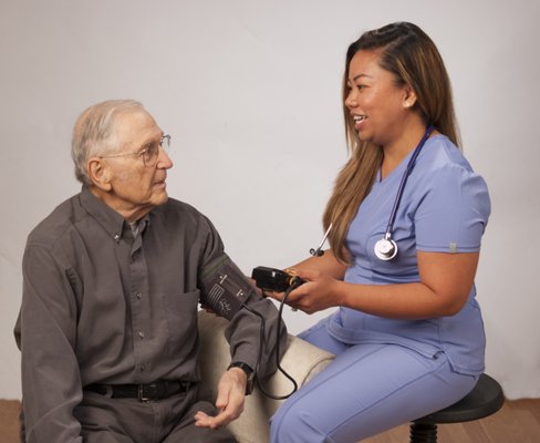 Personal Care and Companionship - Registered Nurse assessing patient Personal Care and Companionship - Registered Nurse assessing patient